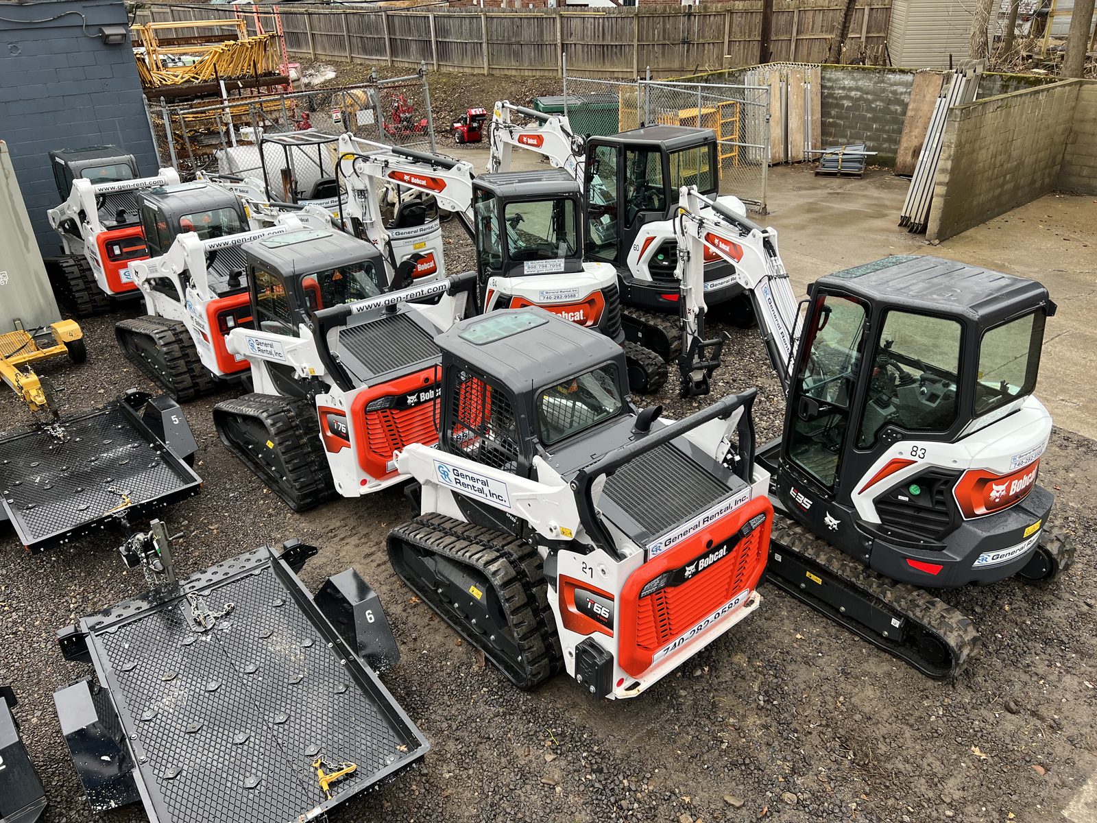 Overhead view of Bobcat compact track loaders (T66, T76) and E35 mini excavator lined up in General Rental's Steubenville yard